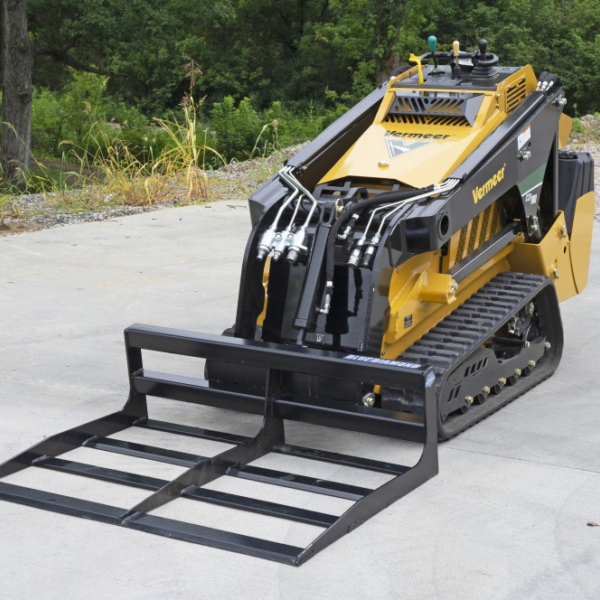 Blue diamond mini land plane attachment on mini skid steer